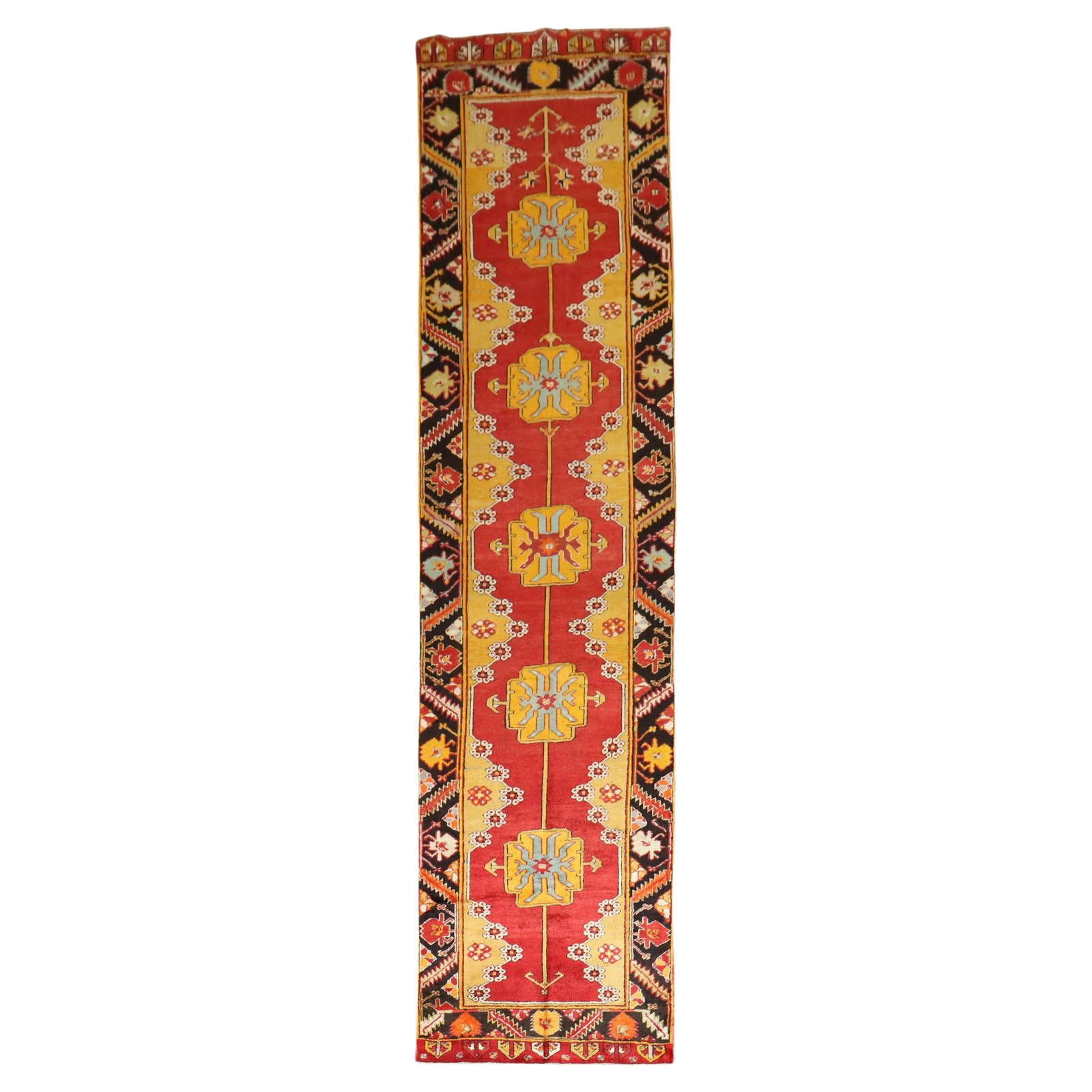 Zabihi Collection Early 20th Century Turkish Karapinar 13' Runner Wool Hand-Knotted Agra Style: Zabihi Collection Early 20th Century Turkish Karapinar 13' Runner Wool Hand-Knotted Agra Style This stunning early 20th-century Turkish Karapinar runner features rich, vibrant colors that beautifully 