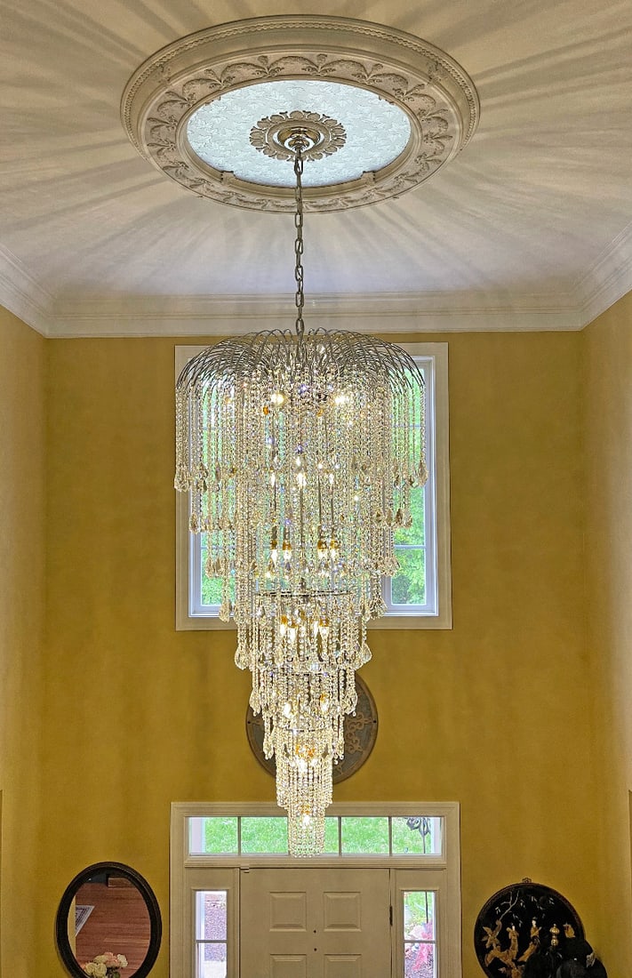 Artistry Falls Gold Crystal 23-Light Foyer Chandelier 70in: Artistry Falls Gold Crystal 23-Light Foyer Chandelier 70in This large 23-light chandelier features a gold-plated frame adorned with high-quality Grand King Cut K-9 crystals, creating a striking center