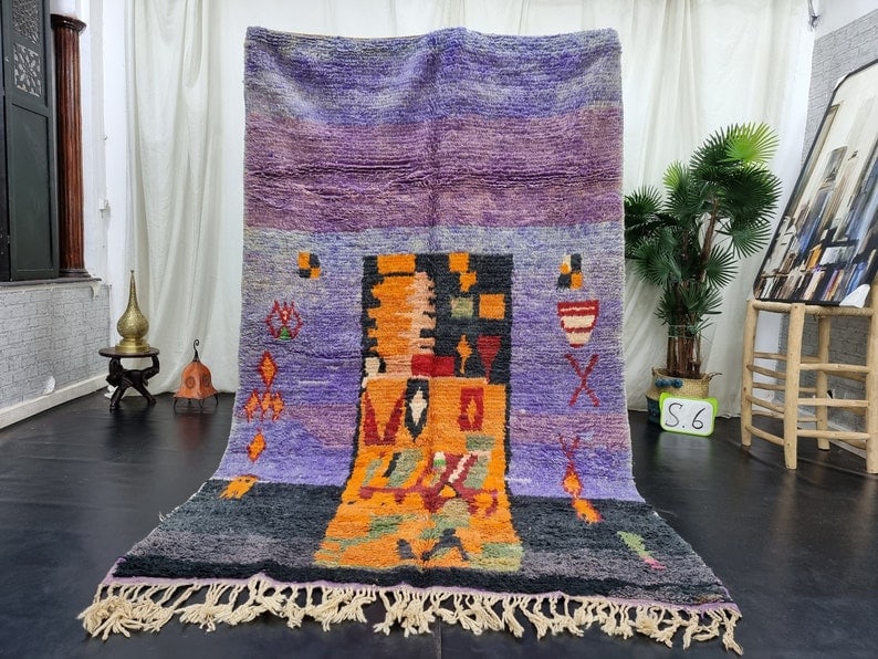 Handmade Moroccan Berber Wool Rug 10 x 5 Feet: Handmade Moroccan Berber Wool Rug 10 x 5 Feet Enhance your space with this stunning handmade Moroccan Berber wool rug, crafted with care by local Berber women weavers in the Atlas Mountains. Made from