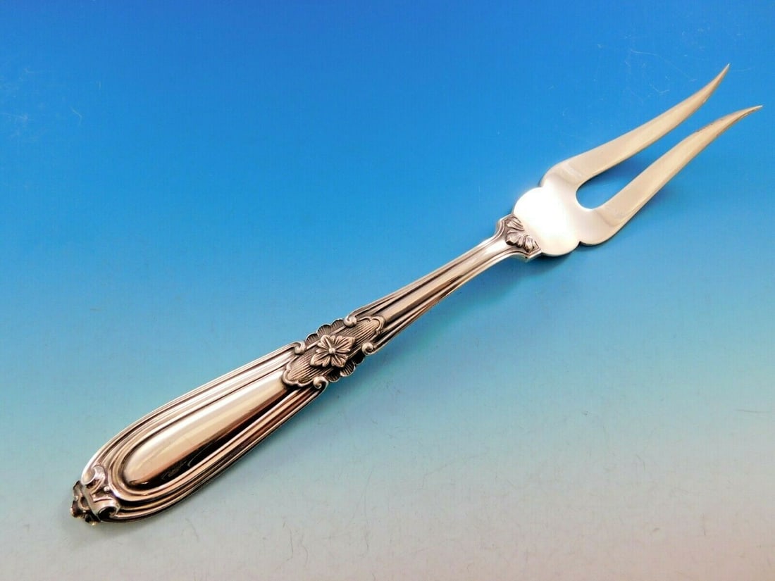 Buccellati Esteval Sterling Silver Vegetable Serving Fork 10 3/8": Buccellati Esteval Sterling Silver Vegetable Serving Fork 10 3/8" This exquisite vegetable serving fork from the Esteval pattern by Buccellati showcases a perfect blend of handcrafted artistry and tim