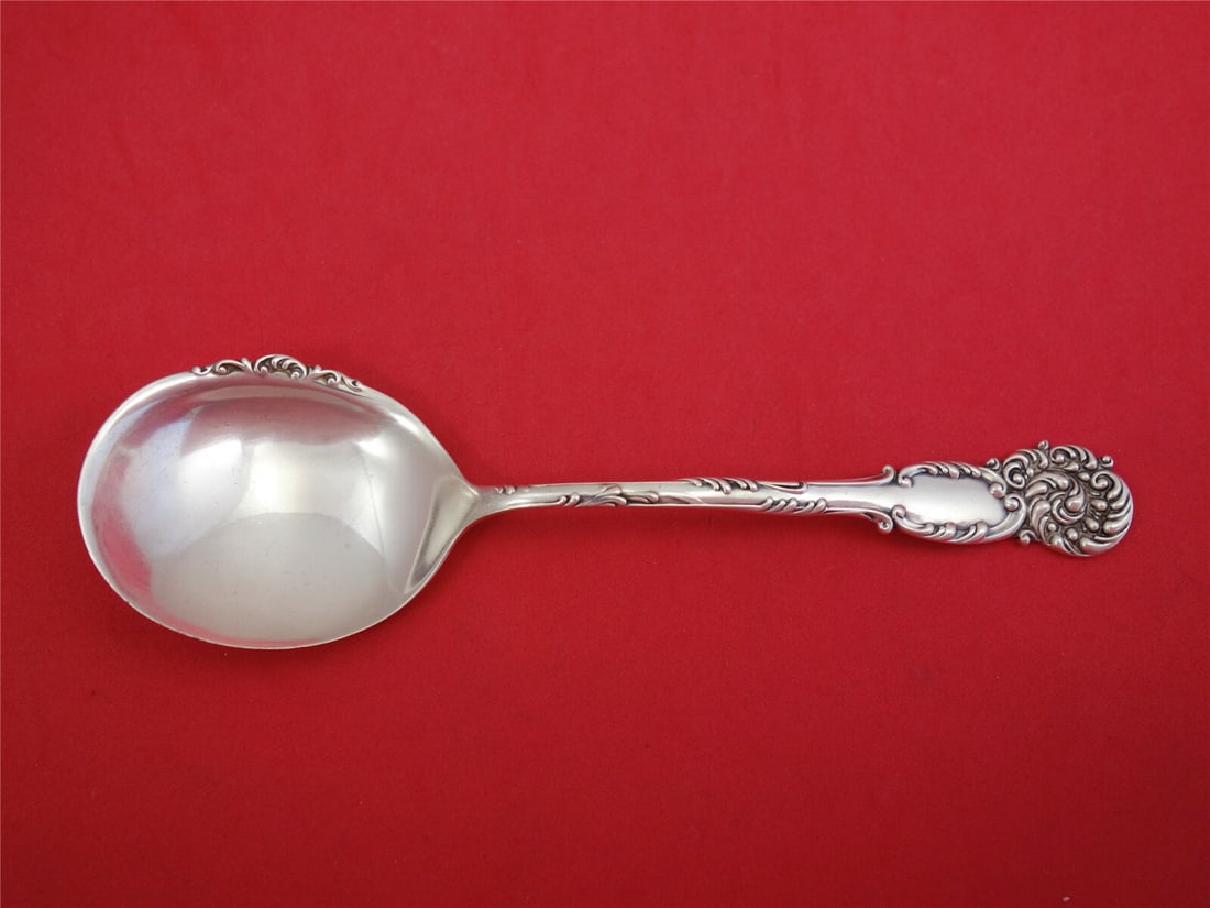Reed & Barton La Reine Sterling Silver Preserve Spoon 7 3/8": Reed & Barton La Reine Sterling Silver Preserve Spoon 7 3/8" This exquisite preserve spoon from Reed & Barton features the elegant La Reine pattern, showcasing intricate design work along the side of 