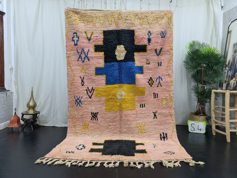 Handmade Moroccan Berber Wool Area Rug 8 x 5 Feet: Handmade Moroccan Berber Wool Area Rug 8 x 5 Feet Experience the beauty and craftsmanship of this stunning handmade Moroccan Berber wool area rug. Handwoven in the Atlas Mountains by skilled Berber wo