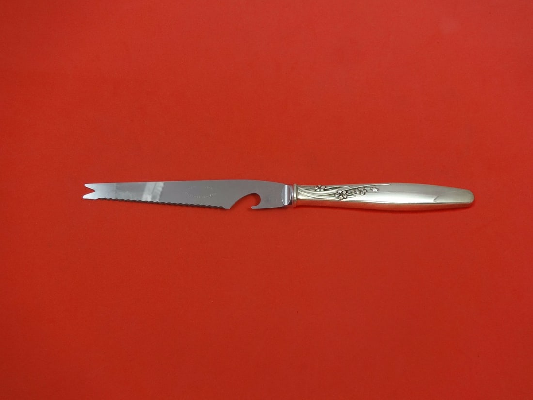 Lunt Summer Song Sterling Silver Custom Bar Knife 9 1/8": Lunt Summer Song Sterling Silver Custom Bar Knife 9 1/8" This exquisite Summer Song bar knife, crafted by Lunt, features a beautiful sterling silver hollow handle and a durable stainless steel impleme