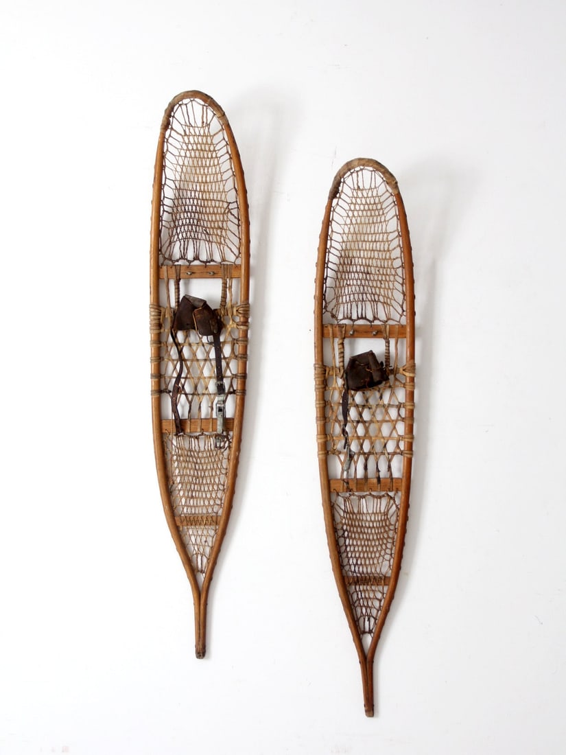 Vintage AF&H Co Long-Trail Snowshoes Rustic Decor 57": Vintage AF&H Co Long-Trail Snowshoes Rustic Decor 57" Discover the charm of these vintage AF&H Co. long-trail snowshoes, expertly crafted in Wallingford, Connecticut during the mid 20th century. Featu