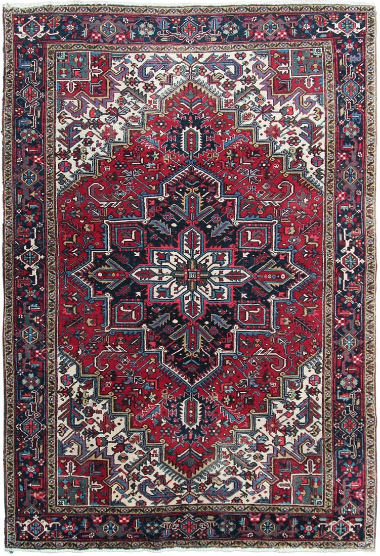 Heriz Serapi Hand Knotted Wool Tribal Rug 8x11 Circa 1940: Heriz Serapi Hand Knotted Wool Tribal Rug 8x11 Circa 1940 This authentic antique Persian Heriz rug, crafted circa 1940, features a striking geometric medallion design in a rich red palette with accent