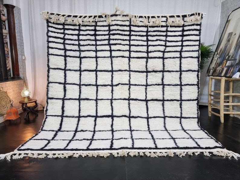 Authentic Handwoven Soft White Black Checkered Rug 8 x 6.56 Feet: Authentic Handwoven Soft White Black Checkered Rug 8 x 6.56 Feet This stunning soft white and black checkered rug is handwoven in the Atlas Mountains by local Berber women weavers, utilizing tradition