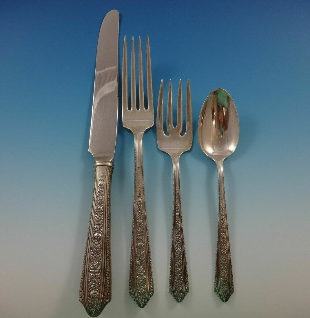 Wallace Normandie Sterling Silver 4-Piece Dinner Place Setting: Wallace Normandie Sterling Silver 4-Piece Dinner Place Setting Introducing a stunning 4-piece dinner size place setting in the Normandie pattern by Wallace, crafted from high-quality sterling silver. 