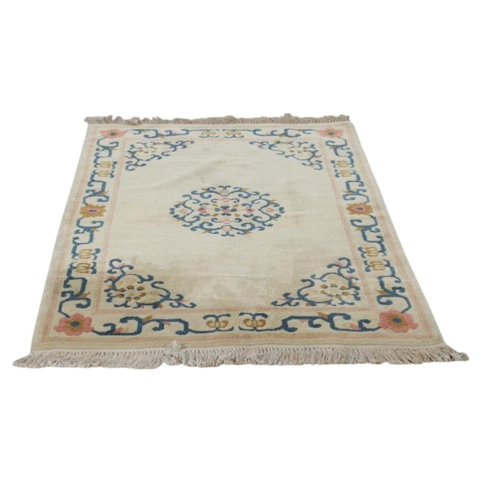 Japanese Peking Style Wool Art Deco Rug c1930: Japanese Peking Style Wool Art Deco Rug c1930 This vintage Japanese Art Deco area rug, crafted circa 1930, features a hand-woven 100% wool pile in the Peking Style. The rug displays a serene cream-col