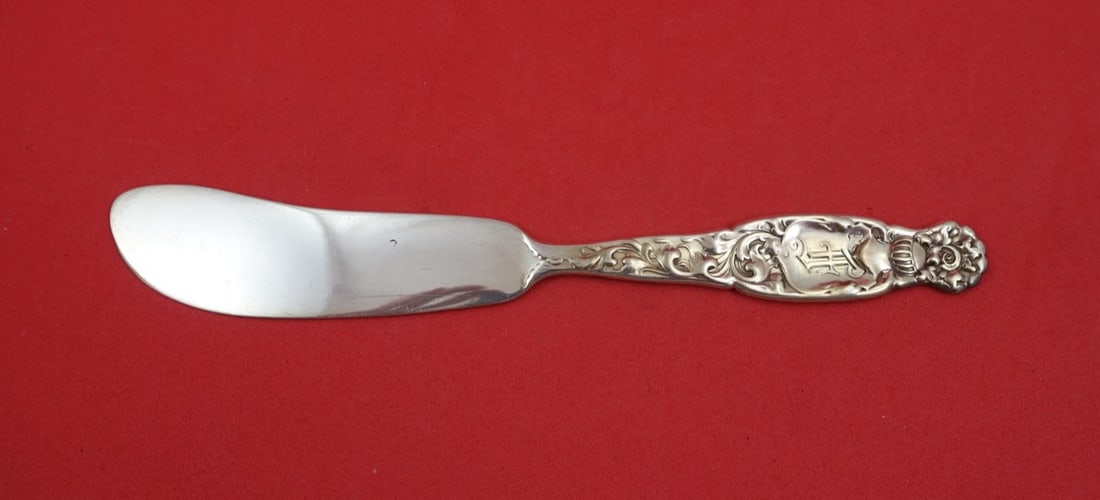Sterling Silver Master Butter Knife Heraldic Pattern by Whiting 7.5 Inch: Sterling Silver Master Butter Knife Heraldic Pattern by Whiting 7.5 Inch This is a Whiting sterling silver master butter knife in the Heraldic pattern, featuring a flat handle and blade. The knife mea