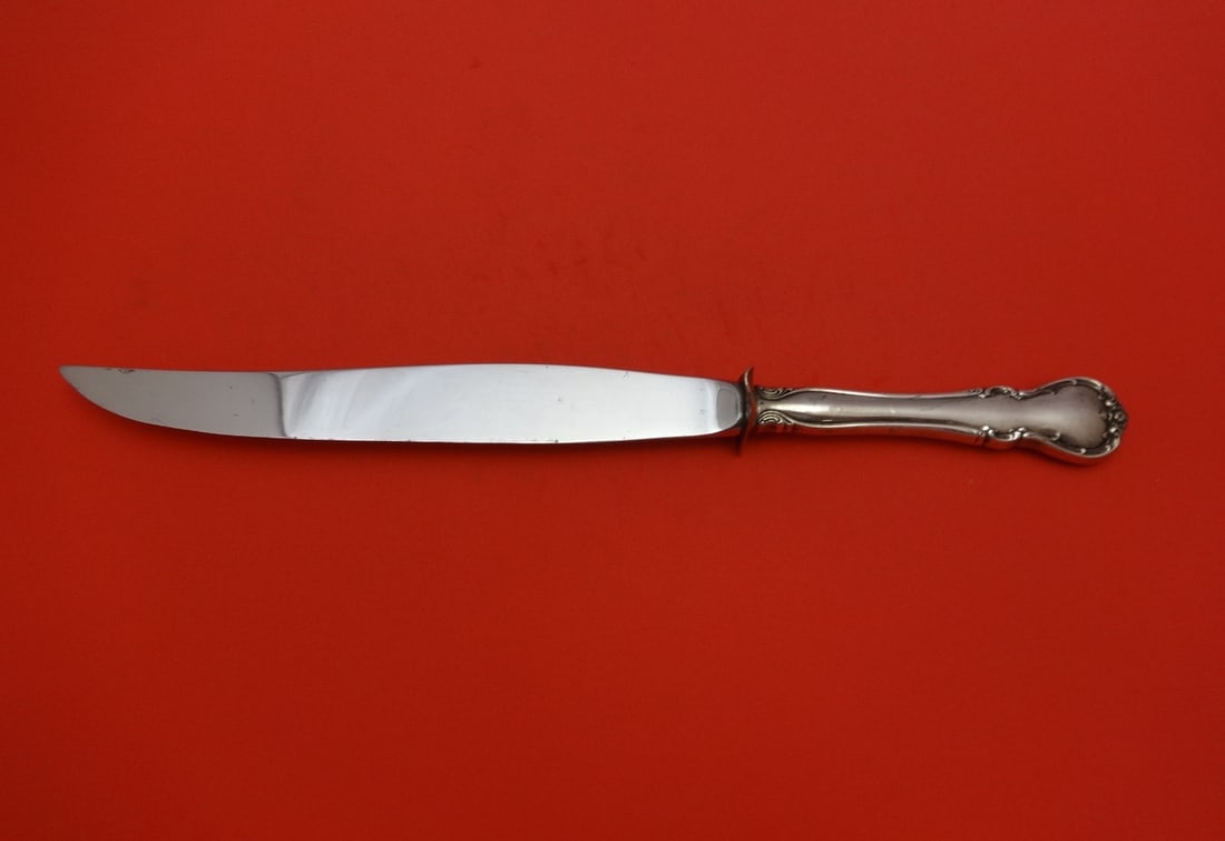Towle French Provincial Sterling Silver Roast Carving Knife 13 1/4": Towle French Provincial Sterling Silver Roast Carving Knife 13 1/4" This exquisite roast carving knife showcases the elegant French Provincial pattern by Towle. Made from high-quality sterling silver,