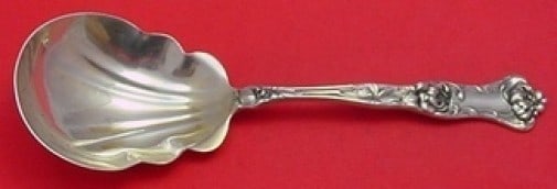 Wallace Peony Sterling Silver Scalloped Berry Spoon 8 5/8: Wallace Peony Sterling Silver Scalloped Berry Spoon 8 5/8 This is a sterling silver berry spoon in the Peony pattern by Wallace. Featuring a scalloped bowl, this serving spoon measures 8 5/8 inches in