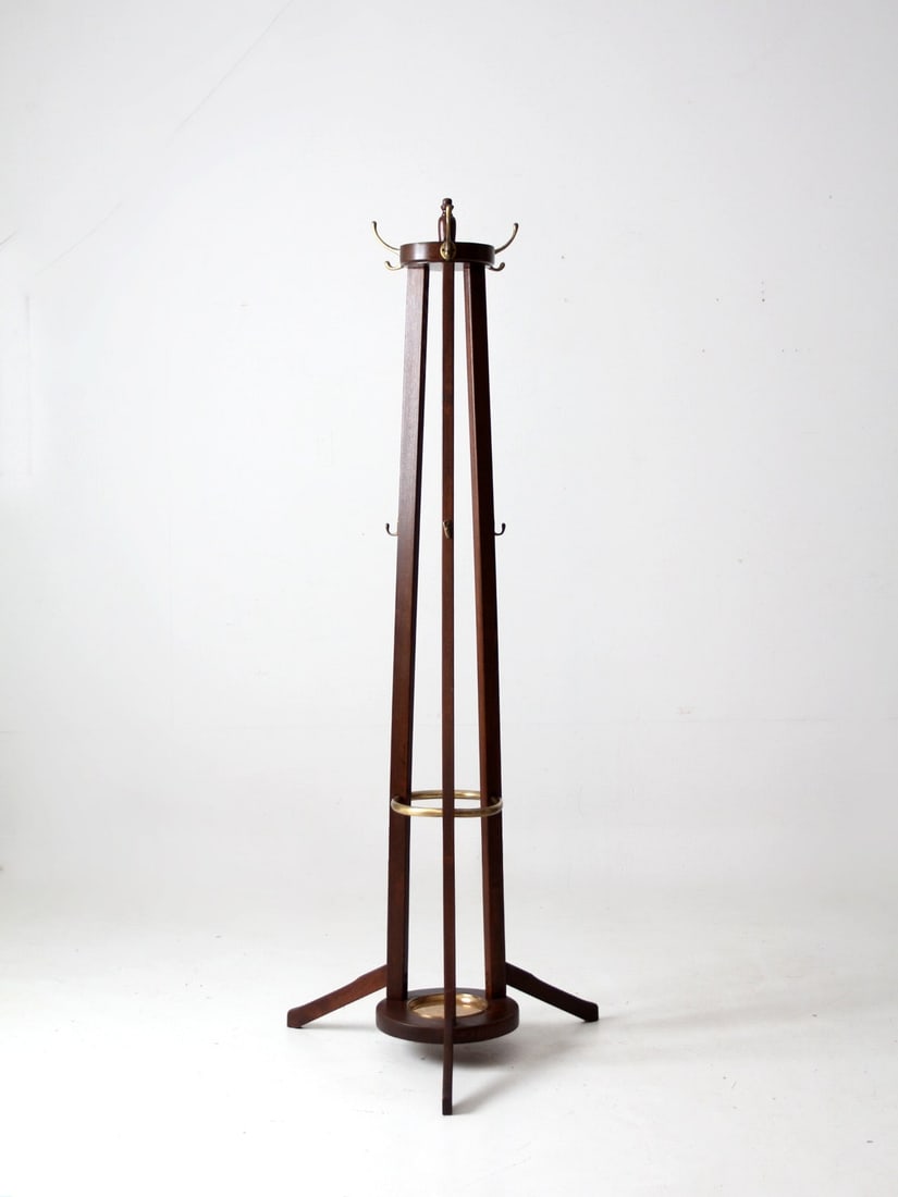 Mid-Century Wooden Hall Tree with Brass Hooks and Umbrella Holder: Mid-Century Wooden Hall Tree with Brass Hooks and Umbrella Holder This mid-century hall tree from the mid-20th century combines functionality with classic design. Crafted from wood, it features a stur