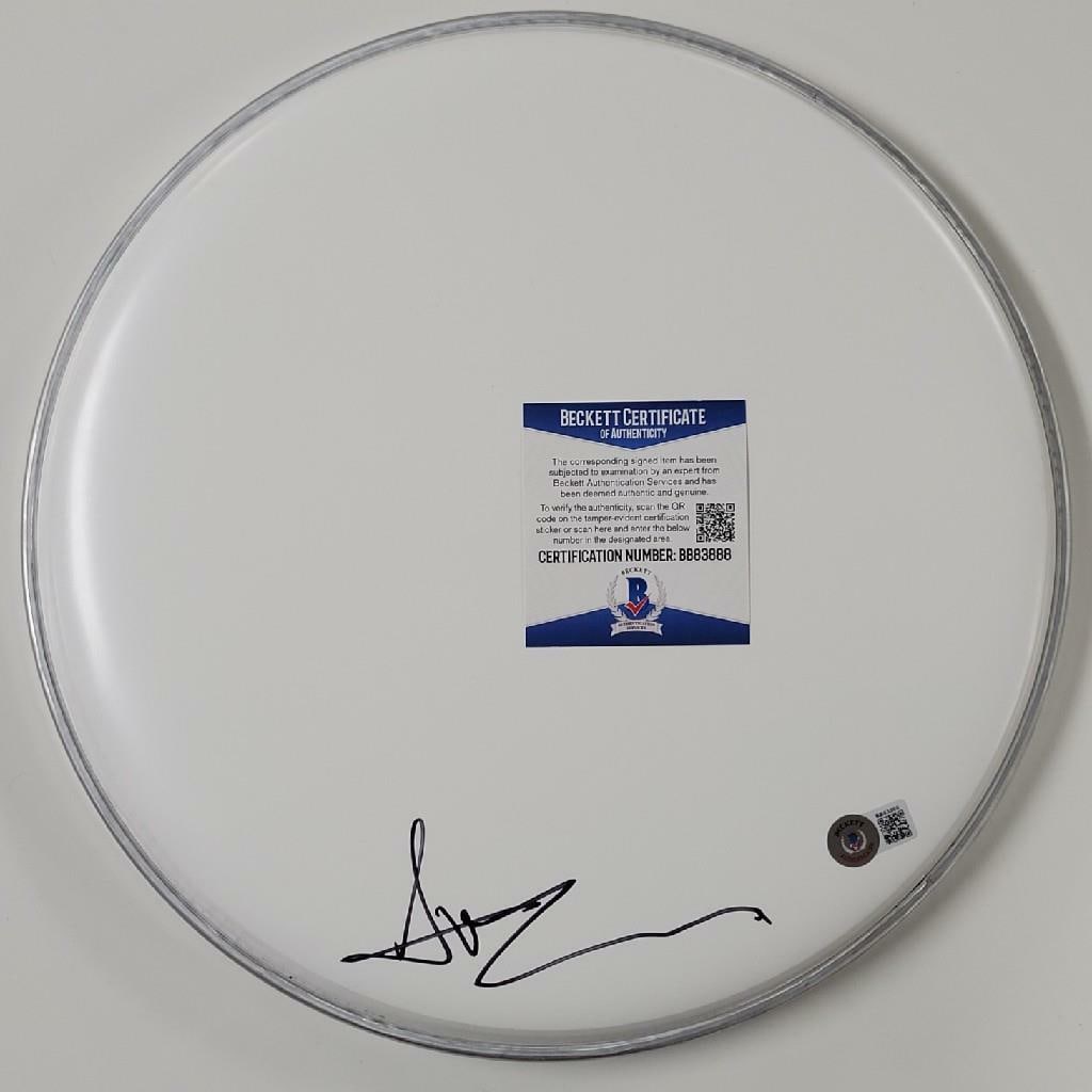 12 Inch Drumhead Autographed by Avril Lavigne Beckett Certified: 12 Inch Drumhead Autographed by Avril Lavigne Beckett Certified This original 12-inch drumhead has been personally signed by singer Avril Lavigne. The autograph is authenticated by Beckett, ensuring i