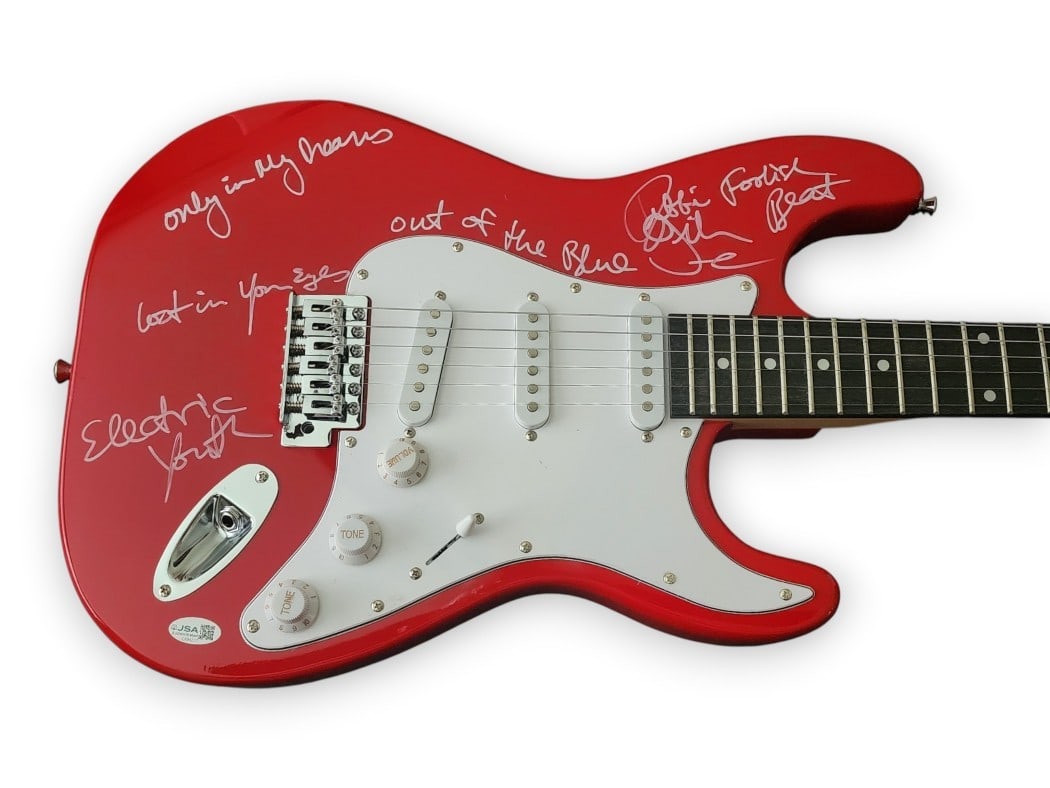 Debbie Gibson Autographed Electric Guitar With Song Inscriptions JSA Authenticated: Debbie Gibson Autographed Electric Guitar With Song Inscriptions JSA Authenticated This electric guitar has been personally signed by Debbie Gibson and inscribed with five different song titles, inclu