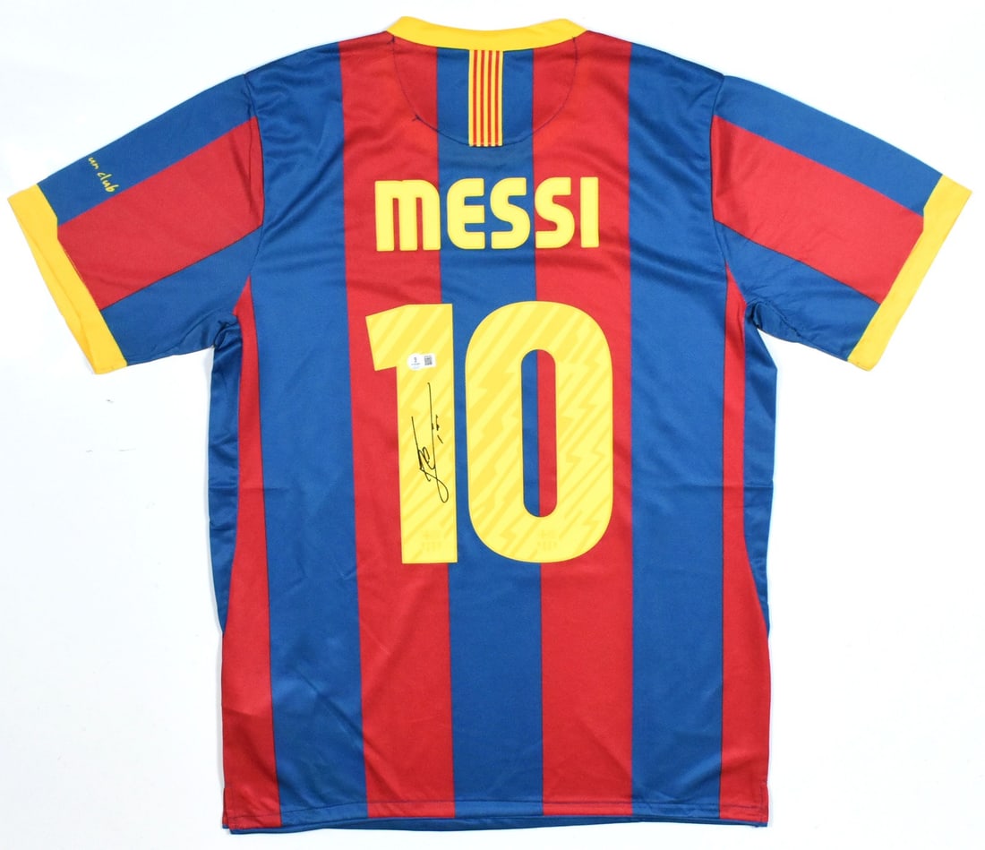 FC Barcelona Home Jersey Signed by Lionel Messi Beckett Holo LOA: FC Barcelona Home Jersey Signed by Lionel Messi Beckett Holo LOA This pre-owned FC Barcelona home soccer jersey features the number 10 and has been autographed by Lionel Messi. The jersey is an origin