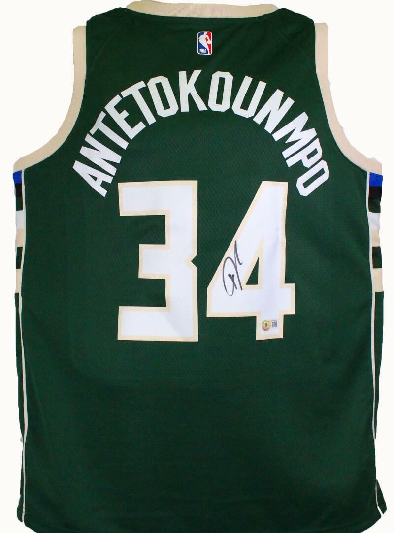 Beckett Authenticated Giannis Antetokounmpo Milwaukee Bucks Green Swingman Jersey: Beckett Authenticated Giannis Antetokounmpo Milwaukee Bucks Green Swingman Jersey Autographed Giannis Antetokounmpo Milwaukee Bucks green swingman jersey. The jersey is identified as original and is i