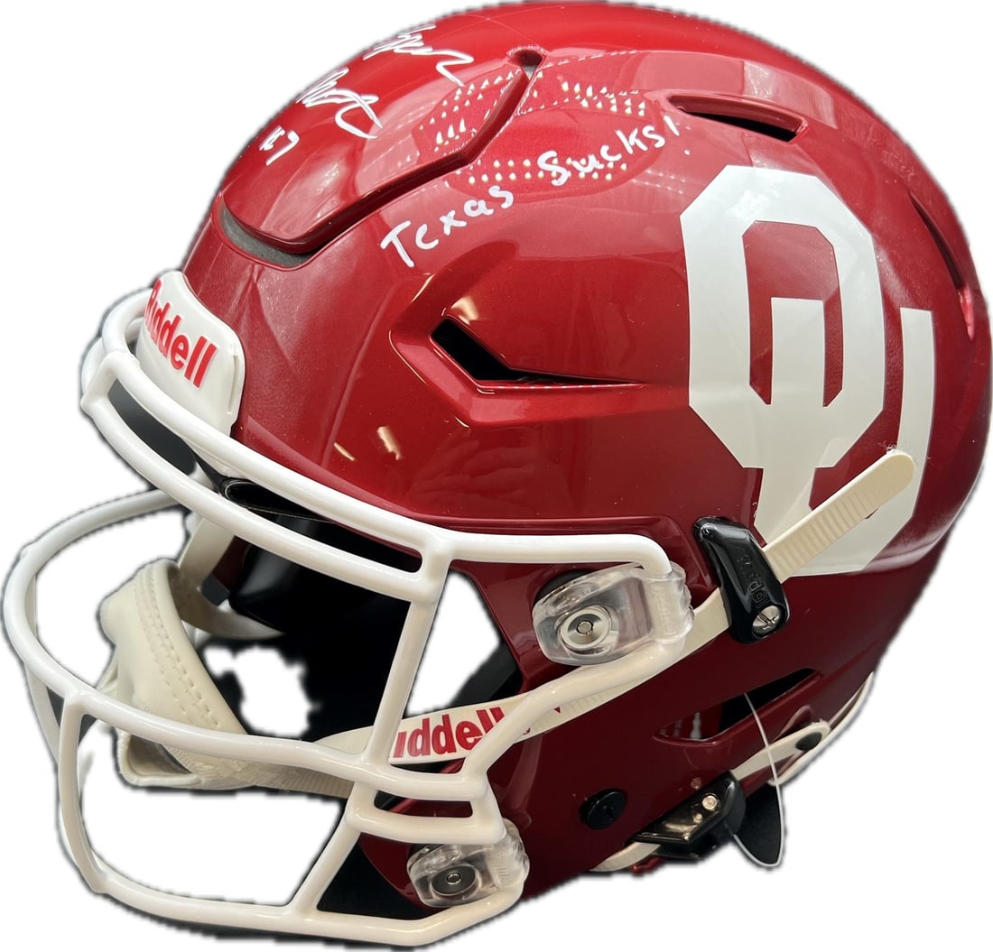 PSA DNA Spencer Rattler autographed replica Riddell helmet Texas Sucks: PSA DNA Spencer Rattler autographed replica Riddell helmet Texas Sucks This is a replica full-size Riddell helmet featuring the Oklahoma Sooners, autographed by Spencer Rattler. The helmet includes th