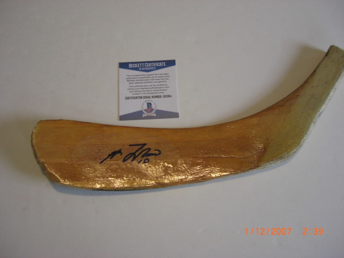 Guy Lafleur Signed Montreal Canadiens Game Used Stick with Beckett COA: Guy Lafleur Signed Montreal Canadiens Game Used Stick with Beckett COA This is a pre-owned, game-used hockey stick end signed by Guy Lafleur of the Montreal Canadiens. The item is original and comes w