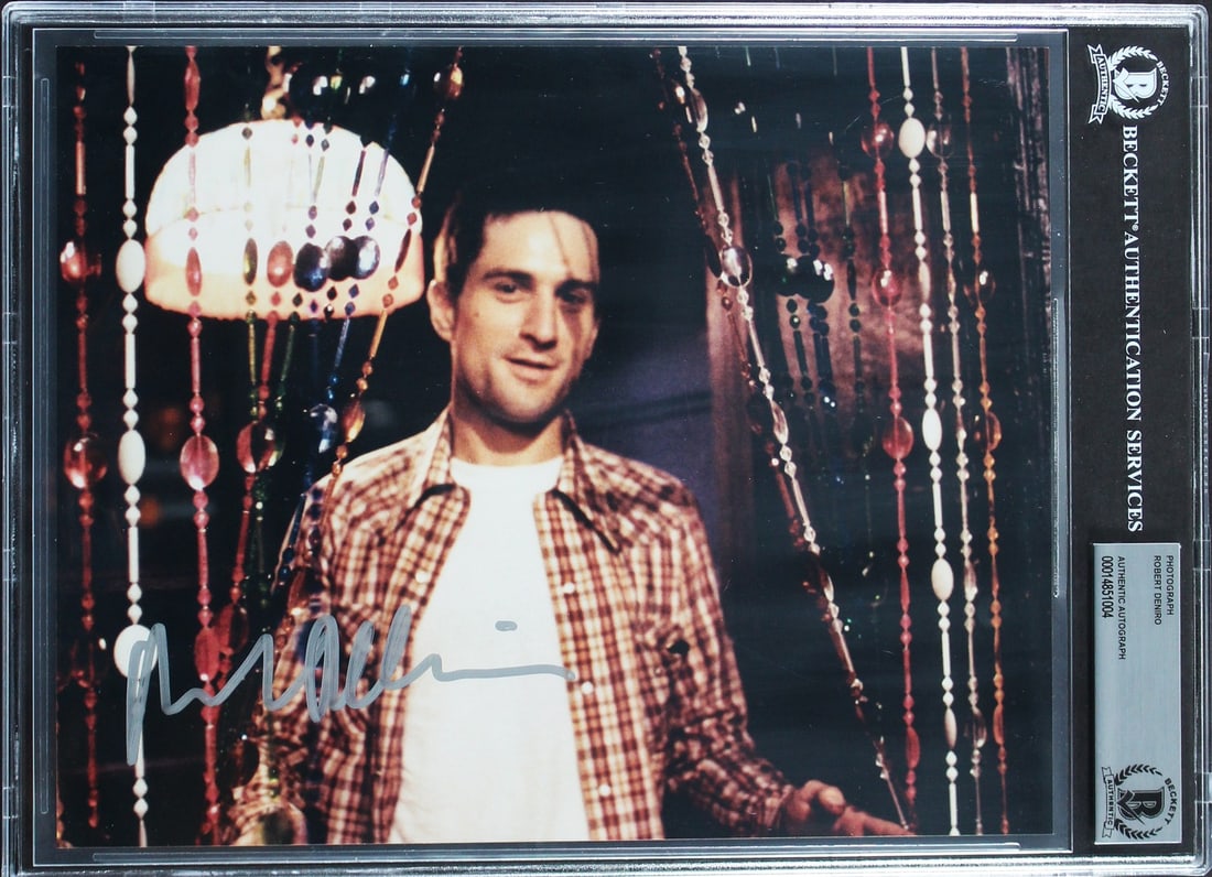 Robert DeNiro Signed Taxi Driver 8x10 Photograph Beckett Authenticated Slabbed: Robert DeNiro Signed Taxi Driver 8x10 Photograph Beckett Authenticated Slabbed This 8x10 photograph features a genuine autograph from Robert DeNiro, known for his role in Taxi Driver. The photo is sla