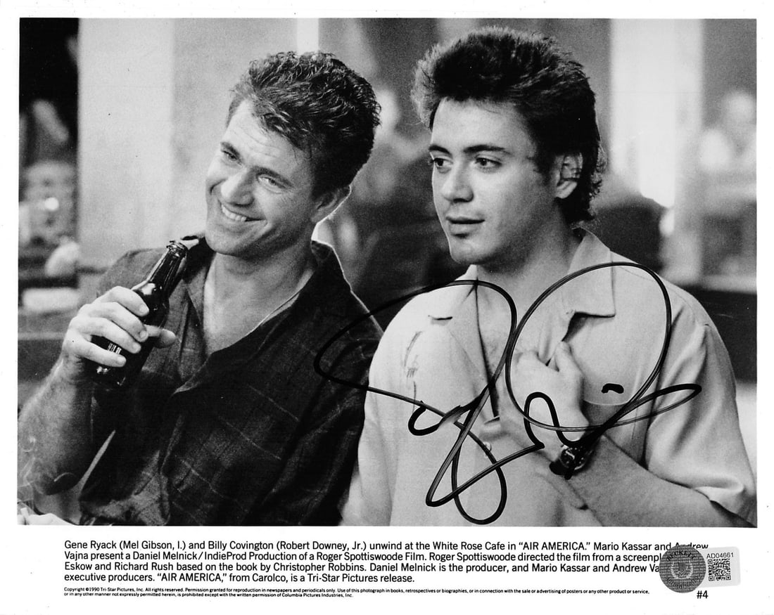Robert Downey Jr. Signed Air America 8x10 Photo BAS Certified: Robert Downey Jr. Signed Air America 8x10 Photo BAS Certified This authentic signed black and white 8x10 photograph features Robert Downey Jr. from the film 'Air America.' The photograph has been pers