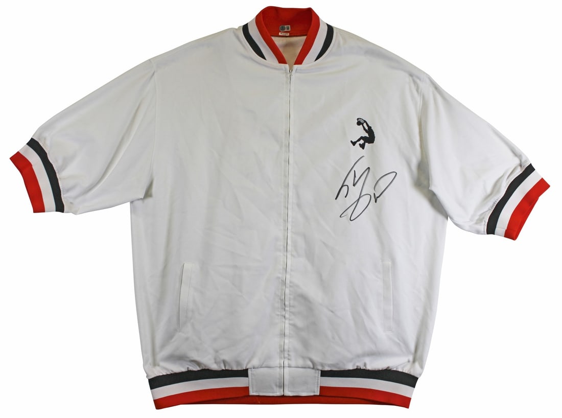 Shaquille O'Neal Signed White Adidas Warm-Up Jacket BAS Authenticated: Shaquille O'Neal Signed White Adidas Warm-Up Jacket BAS Authenticated This authentic white Adidas warm-up jacket has been personally signed by NBA legend Shaquille O'Neal, making it a must-have for an