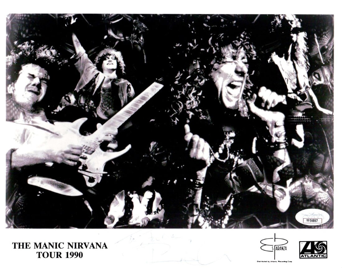 Robert Plant Autographed 8x10 Photo Led Zeppelin 1990 Tour JSA Certified: Robert Plant Autographed 8x10 Photo Led Zeppelin 1990 Tour JSA Certified This is an original 8x10 photograph of Robert Plant, the iconic lead vocalist of Led Zeppelin, signed during the 1990 tour. The