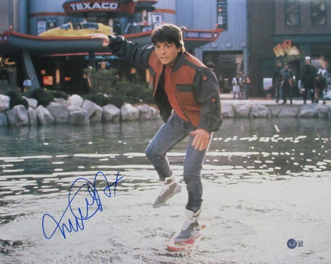 Michael J Fox Back to the Future Signed 16x20 Photo Beckett Certified: Michael J Fox Back to the Future Signed 16x20 Photo Beckett Certified This is a hand-signed original 16x20 inch photograph of Michael J. Fox from the iconic film "Back to the Future." The autograph ha