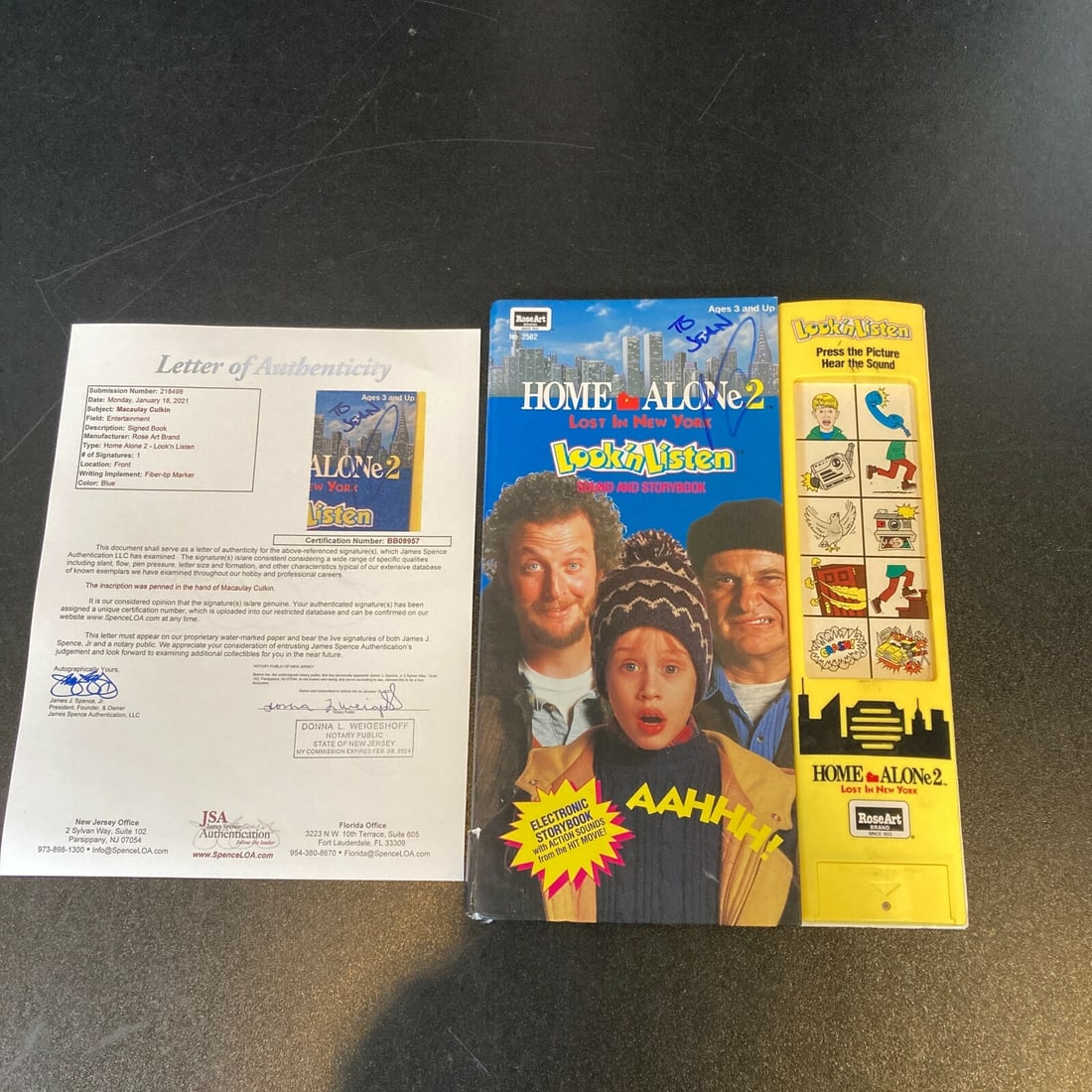 Macaulay Culkin Signed Home Alone Book with JSA Authentication: Macaulay Culkin Signed Home Alone Book with JSA Authentication This is an original Home Alone book signed by Macaulay Culkin, featuring a James Spence Authentication (JSA) Certificate of Authenticity.