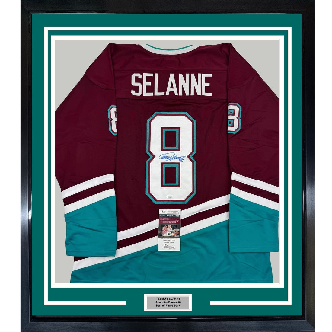 Framed Autographed Teemu Selanne Anaheim Ducks Jersey with JSA COA: Framed Autographed Teemu Selanne Anaheim Ducks Jersey with JSA COA Celebrate the legacy of Teemu Selanne with this stunning framed autographed Anaheim Ducks maroon jersey. Measuring an impressive 35x3