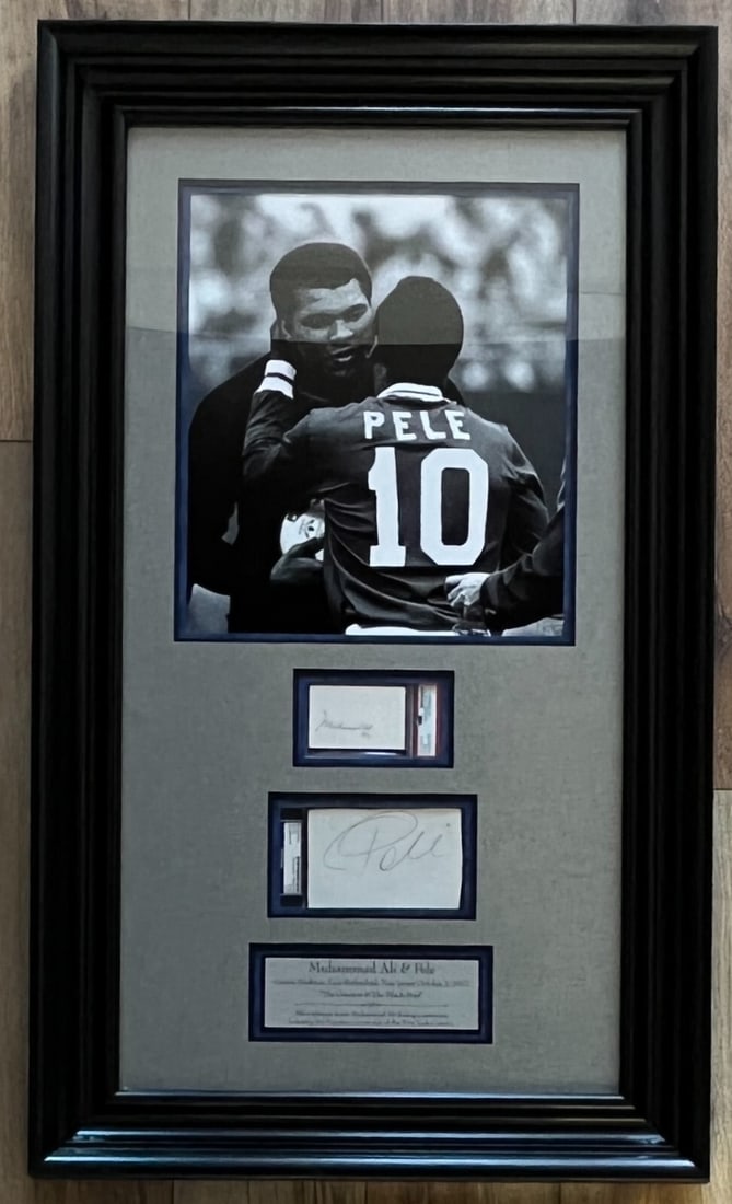 Muhammad Ali Pele Signed Framed Display PSA Authenticated 41 x 24: Muhammad Ali Pele Signed Framed Display PSA Authenticated 41 x 24 This stunning framed display features cut signatures from two of the most iconic athletes in history: Muhammad Ali and Pele. Muhammad 