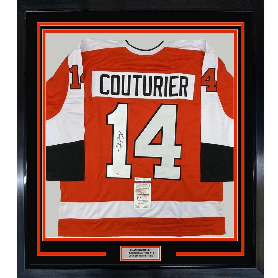 Framed Sean Couturier Signed Flyers Orange Jersey 33x42 JSA COA: Framed Sean Couturier Signed Flyers Orange Jersey 33x42 JSA COA This framed Philadelphia Flyers orange jersey is autographed by Sean Couturier and authenticated by James Spence Authentication (JSA). T