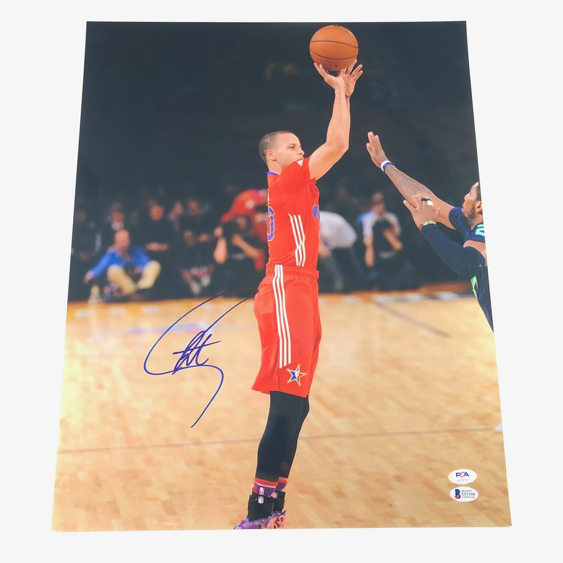 Stephen Curry PSA DNA autographed 16x20 Warriors photo: Stephen Curry PSA DNA autographed 16x20 Warriors photo This 16x20 photo features an authentic signature from Stephen Curry of the Golden State Warriors. The autograph has been professionally authentic