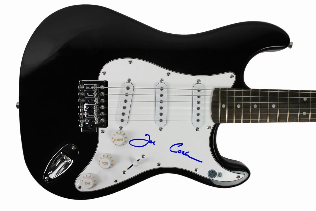 Joe Cocker signed guitar Beckett BAS Gem Mint 10: Joe Cocker signed guitar Beckett BAS Gem Mint 10 This guitar has been personally signed by Joe Cocker and features an autograph graded Gem Mint 10 by Beckett Authentication Services. It includes a Cer