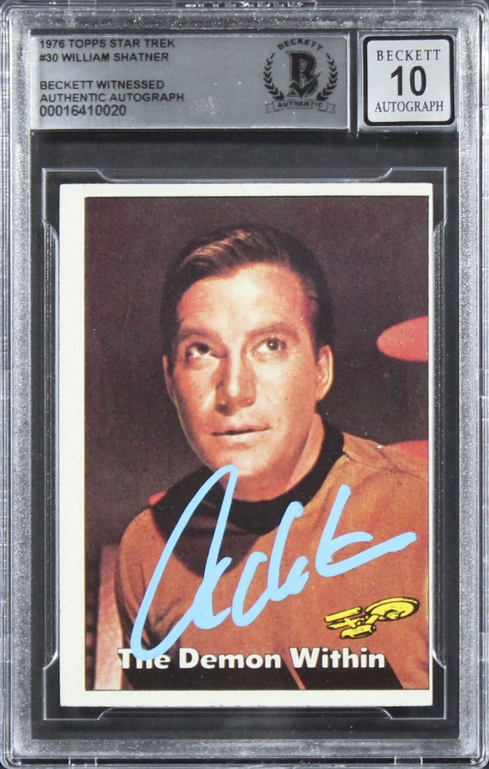 Beckett Authenticated William Shatner Autograph on 1976 Topps Star Trek Card 30: Beckett Authenticated William Shatner Autograph on 1976 Topps Star Trek Card 30 This is an original 1976 Topps Star Trek #30 card personally signed by William Shatner. It is slabbed and authenticated 