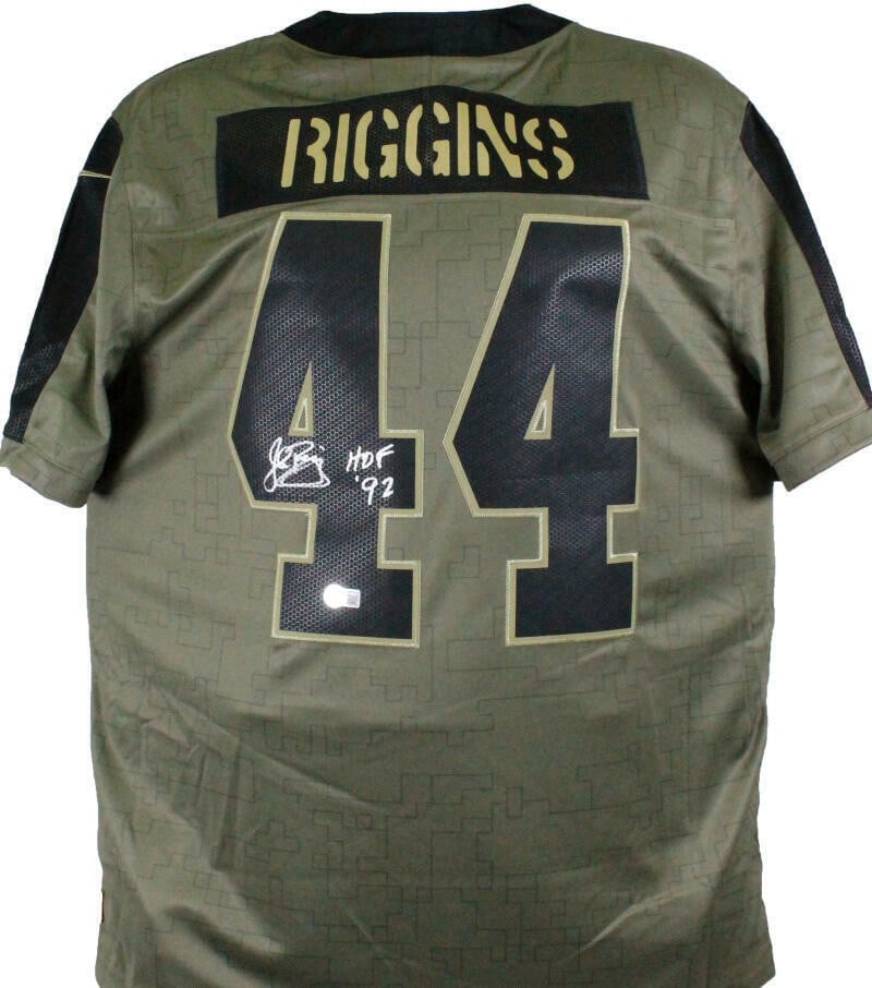 Nike 21 STS Limited Player Jersey signed by John Riggins BAS: Nike 21 STS Limited Player Jersey signed by John Riggins BAS This is an original John Riggins signed Nike '21 STS limited player jersey. It is pre-owned and identified as a jersey product from the Uni