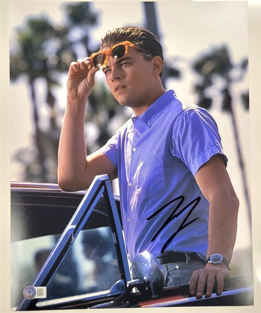 Leonardo DiCaprio Signed Catch Me If You Can 11x14 Photo Beckett Authenticated: Leonardo DiCaprio Signed Catch Me If You Can 11x14 Photo Beckett Authenticated This stunning 11x14 photograph features a bold autograph from Leonardo DiCaprio, captured during his iconic role in the m