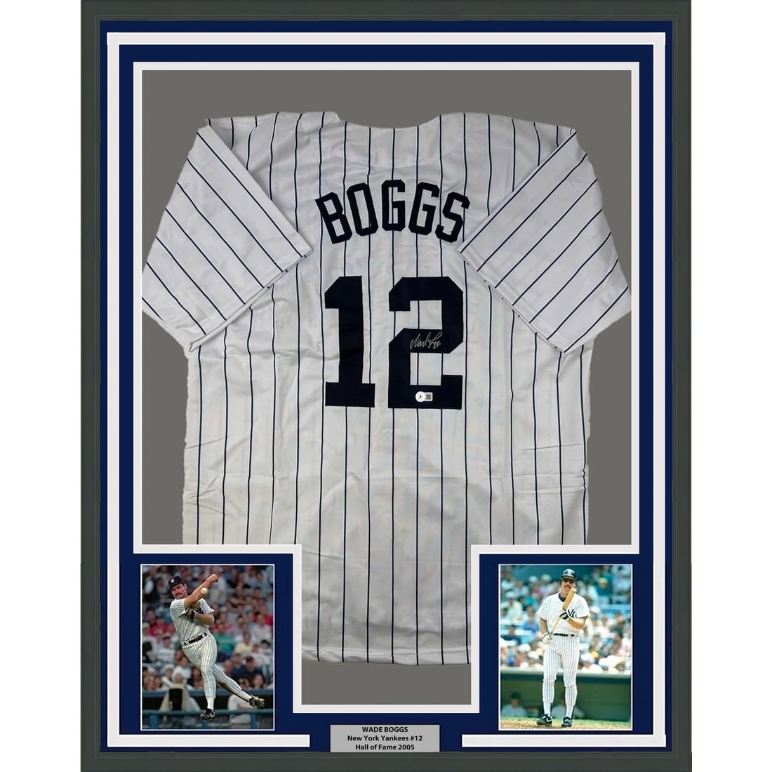 Framed Wade Boggs Autographed New York Yankees Jersey with BAS COA: Framed Wade Boggs Autographed New York Yankees Jersey with BAS COA This stunning framed display features an autographed Wade Boggs New York Yankees pinstripe jersey, measuring 33x42 inches. The jersey