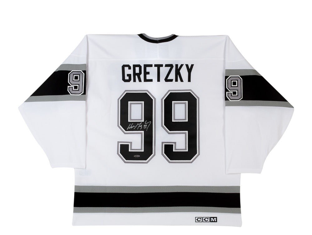 Wayne Gretzky Autographed Los Angeles Kings White Jersey Upper Deck Authenticated: Wayne Gretzky Autographed Los Angeles Kings White Jersey Upper Deck Authenticated This pre-owned Los Angeles Kings white replica jersey by CCM is autographed by Wayne Gretzky. The autograph is authent