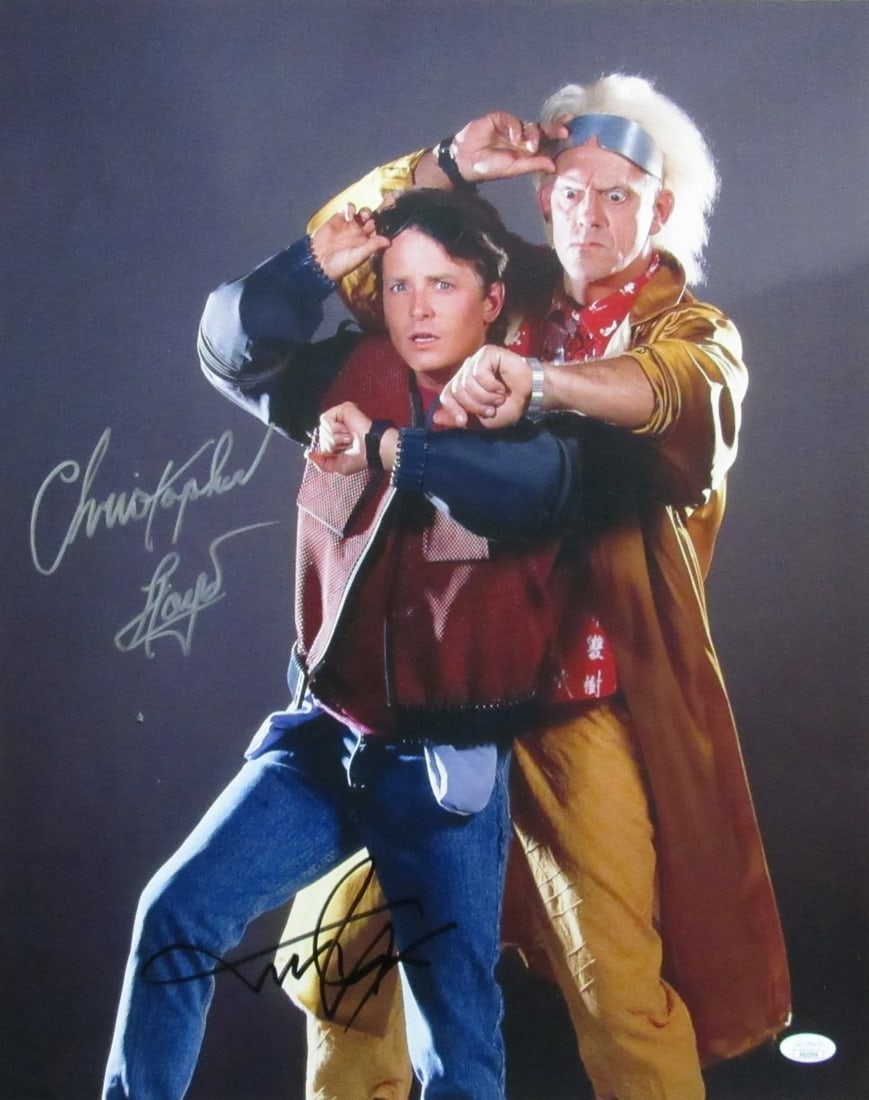 Michael J Fox Christopher Lloyd Signed 16x20 Back to the Future Photo JSA: Michael J Fox Christopher Lloyd Signed 16x20 Back to the Future Photo JSA This exceptional 16x20 photo features the iconic duo Michael J. Fox and Christopher Lloyd, both of whom have personally autogr