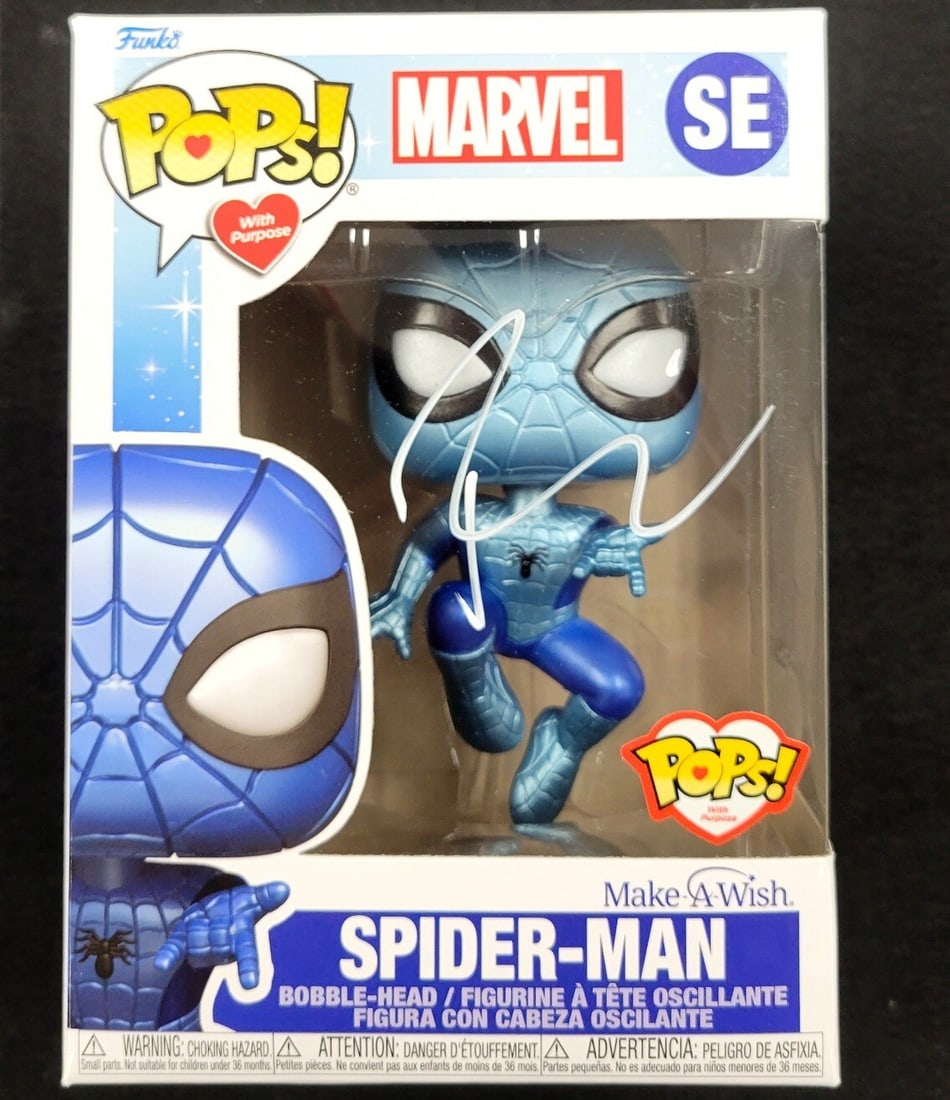 Beckett Authenticated Tobey Maguire Autographed Spider-Man Make-a-Wish Funko Pop: Beckett Authenticated Tobey Maguire Autographed Spider-Man Make-a-Wish Funko Pop This is an original Spider-Man Make-a-Wish Funko Pop featuring an autograph by Tobey Maguire. The signature has been au