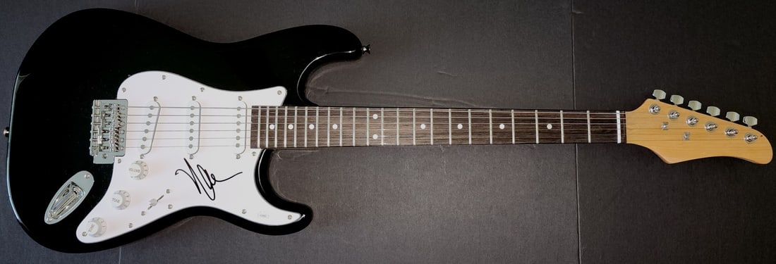 Neal Schon Autographed Electric Guitar JSA Certified Original: Neal Schon Autographed Electric Guitar JSA Certified Original This is an original electric guitar autographed by Neal Schon, the renowned guitarist. The autograph has been authenticated by James Spenc