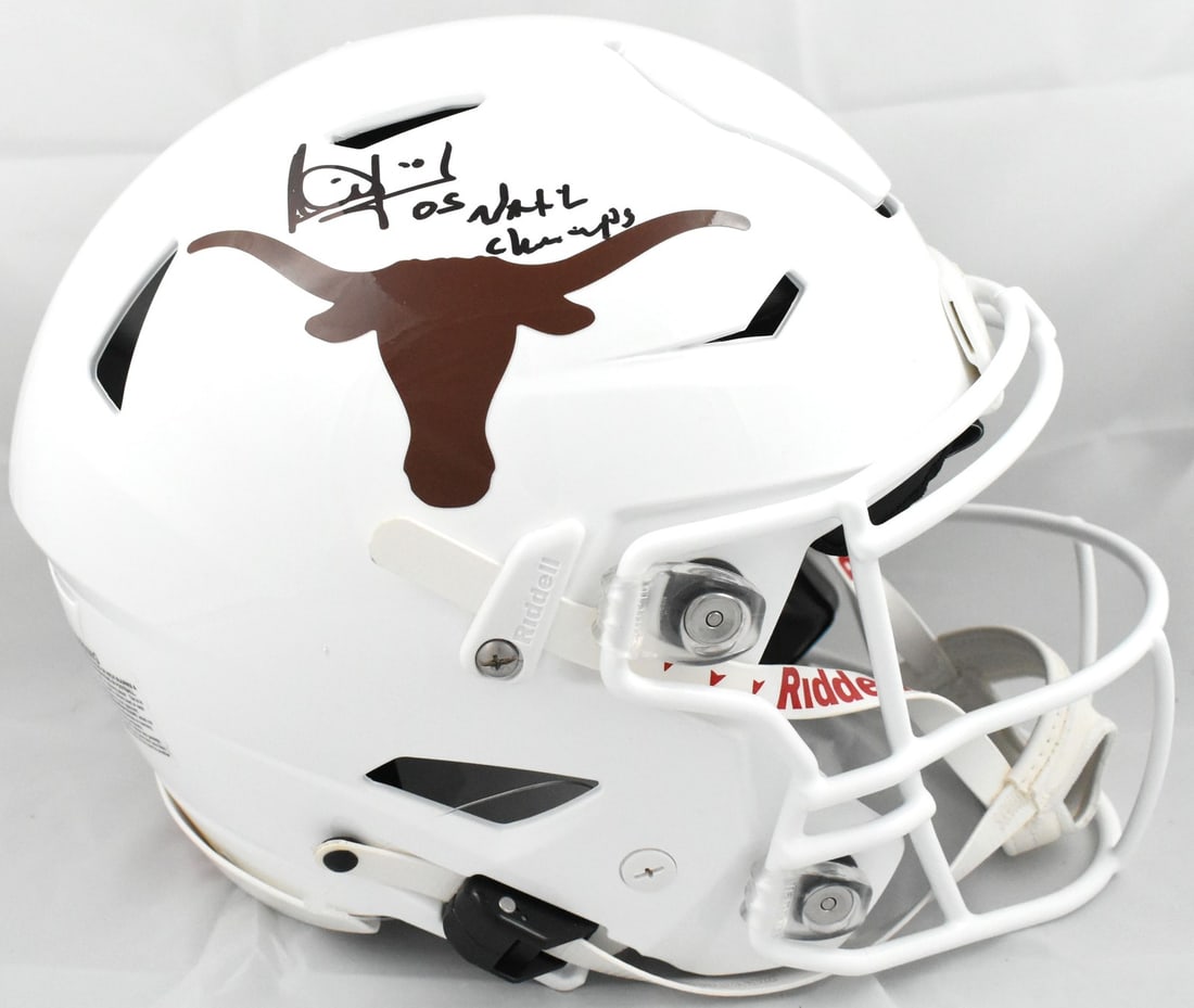 Beckett Witnessed Vince Young autographed Texas Longhorns SpeedFlex helmet: Beckett Witnessed Vince Young autographed Texas Longhorns SpeedFlex helmet This is a pre-owned full-size SpeedFlex helmet featuring the Texas Longhorns, signed by Vince Young. The helmet commemorates