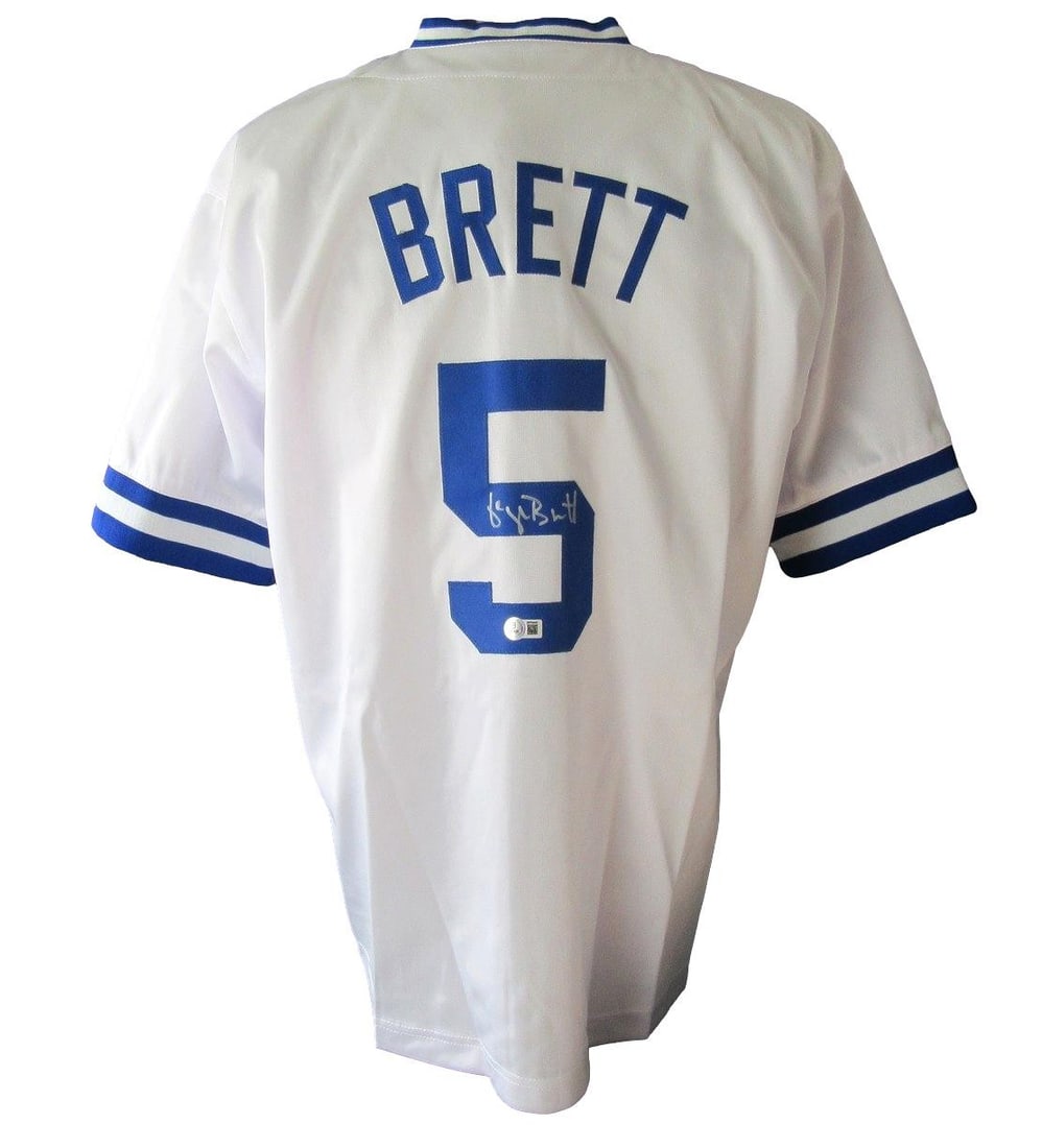 Beckett Witness George Brett HOF Autographed Royals Baseball Jersey: Beckett Witness George Brett HOF Autographed Royals Baseball Jersey Pre-owned custom baseball jersey signed by George Brett with HOF inscription. This original autographed Kansas City Royals jersey is