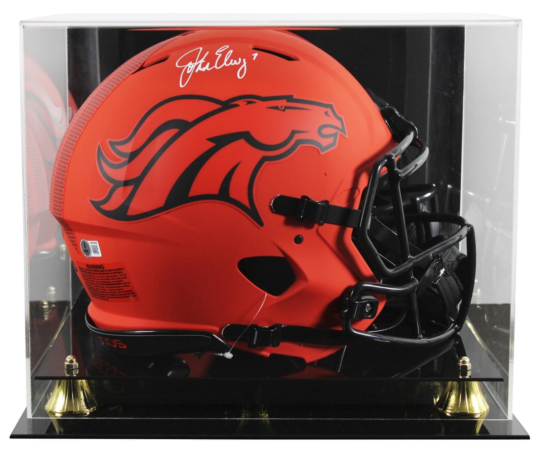 John Elway Autographed Denver Broncos Rave Speed Proline Helmet With Display Case BAS: John Elway Autographed Denver Broncos Rave Speed Proline Helmet With Display Case BAS This full-size Riddell Speed Proline Alternate Rave helmet is personally signed by John Elway of the Denver Bronco