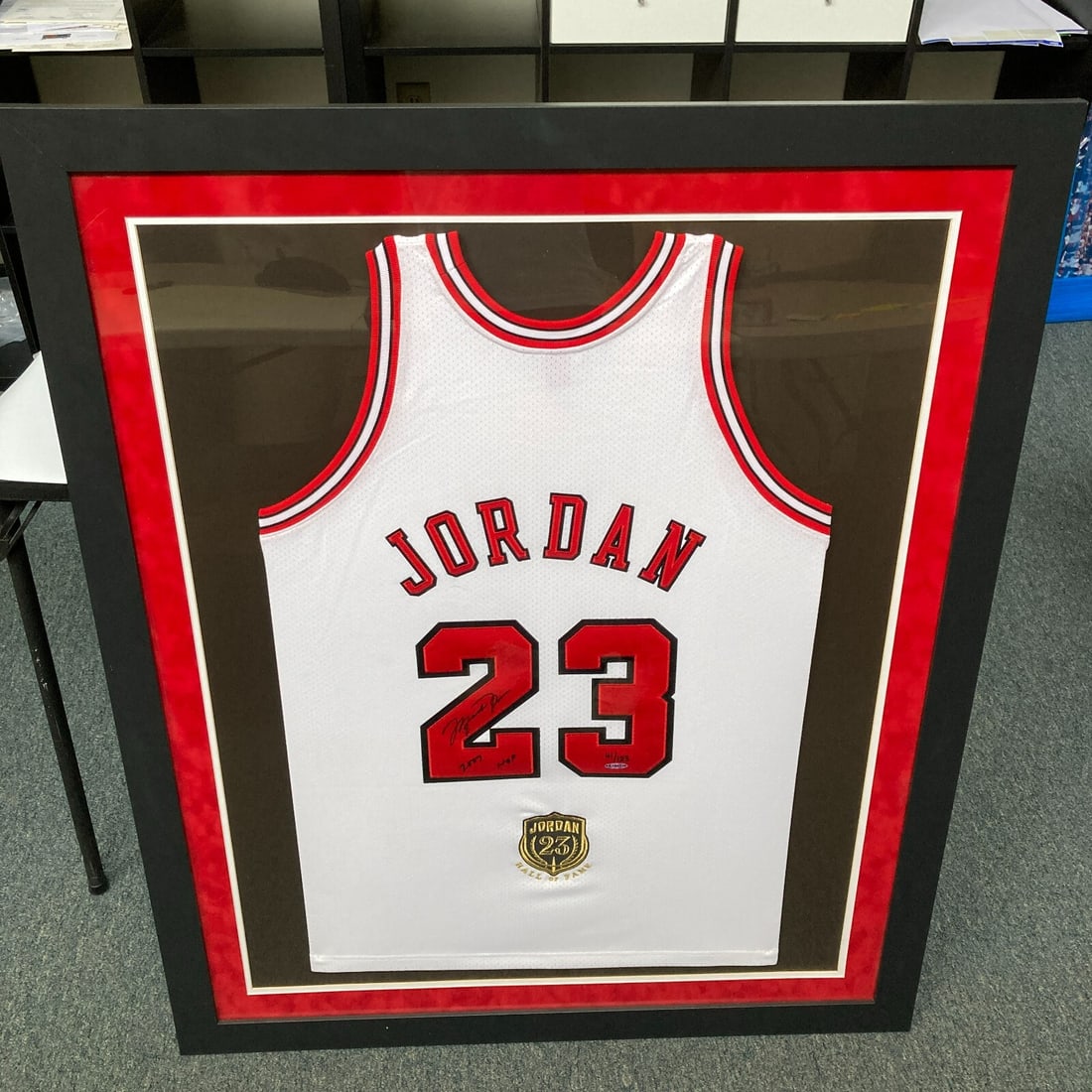 Michael Jordan signed Bulls Mitchell Ness 41 of 123 HOF 2009 jersey: Michael Jordan signed Bulls Mitchell Ness 41 of 123 HOF 2009 jersey This is a limited-edition Mitchell & Ness Chicago Bulls jersey, numbered "41/123" and signed by the legendary Michael Jordan. The je