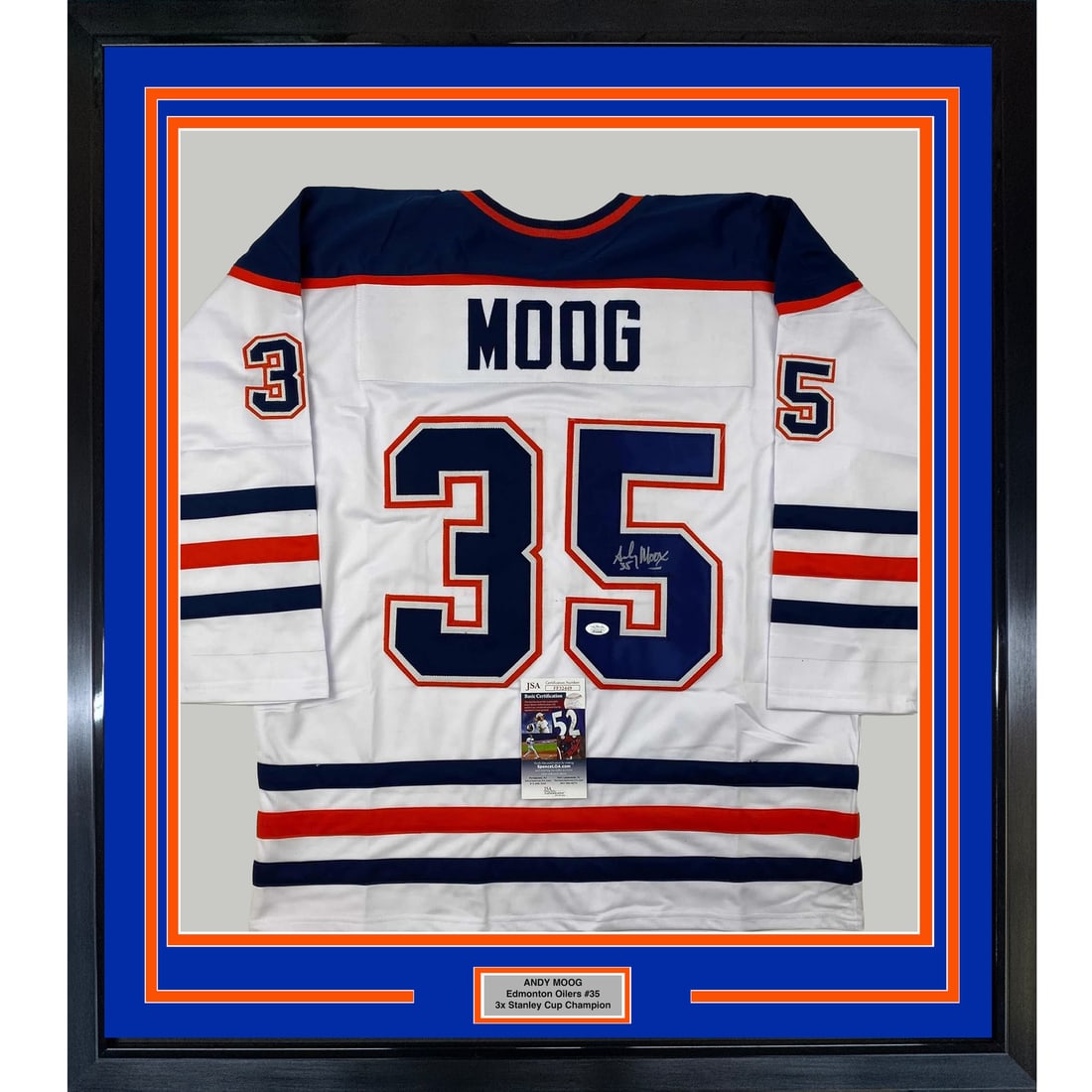 Framed Signed Andy Moog Edmonton Oilers Jersey with JSA COA: Framed Signed Andy Moog Edmonton Oilers Jersey with JSA COA This framed autographed Andy Moog hockey jersey captures the essence of the Edmonton Oilers. It features a high-quality, authentic signature