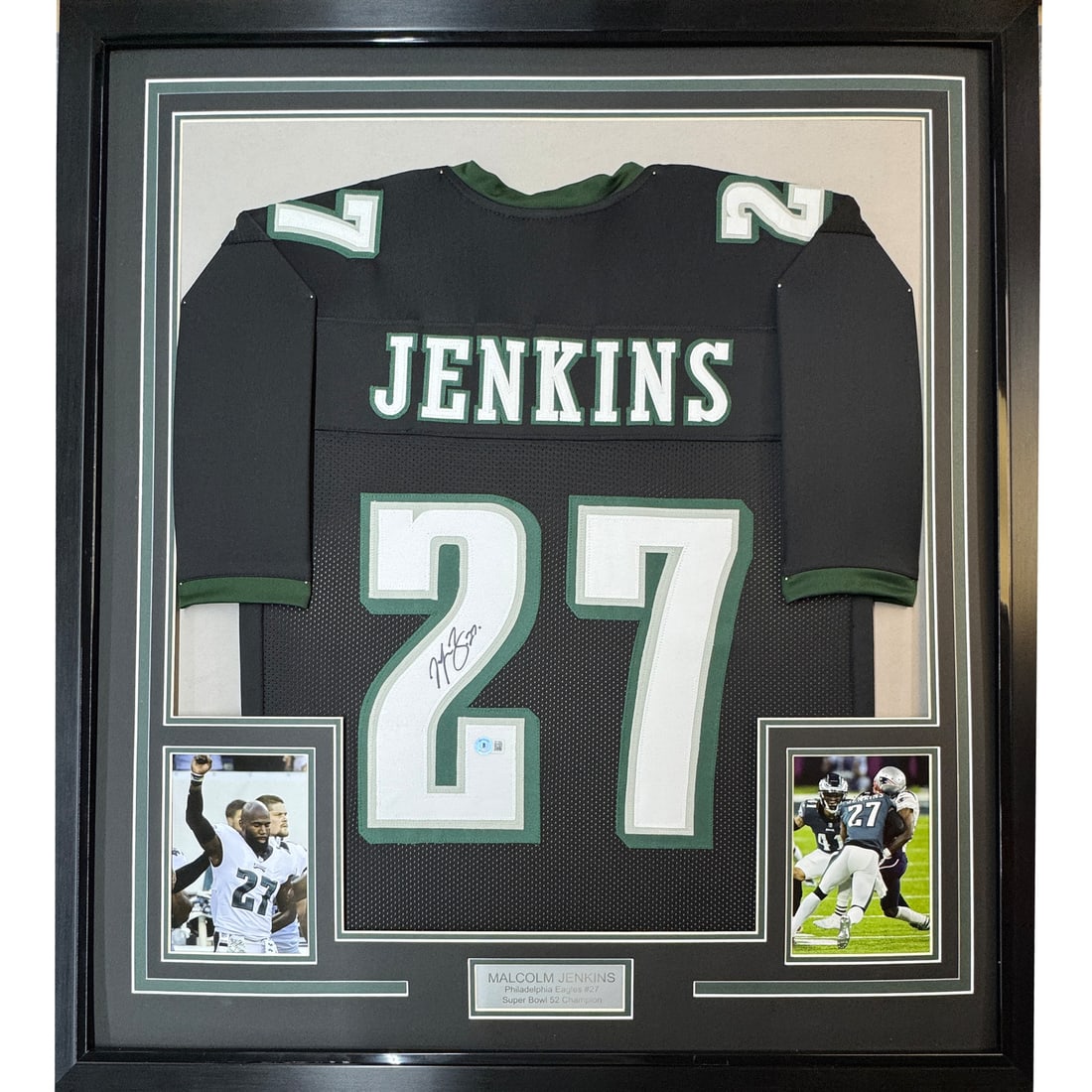 Framed Malcolm Jenkins Autographed Black Jersey with BAS COA NFL: Framed Malcolm Jenkins Autographed Black Jersey with BAS COA NFL Showcase your support for the Philadelphia Eagles with this professionally framed autographed black jersey of Malcolm Jenkins. This ori