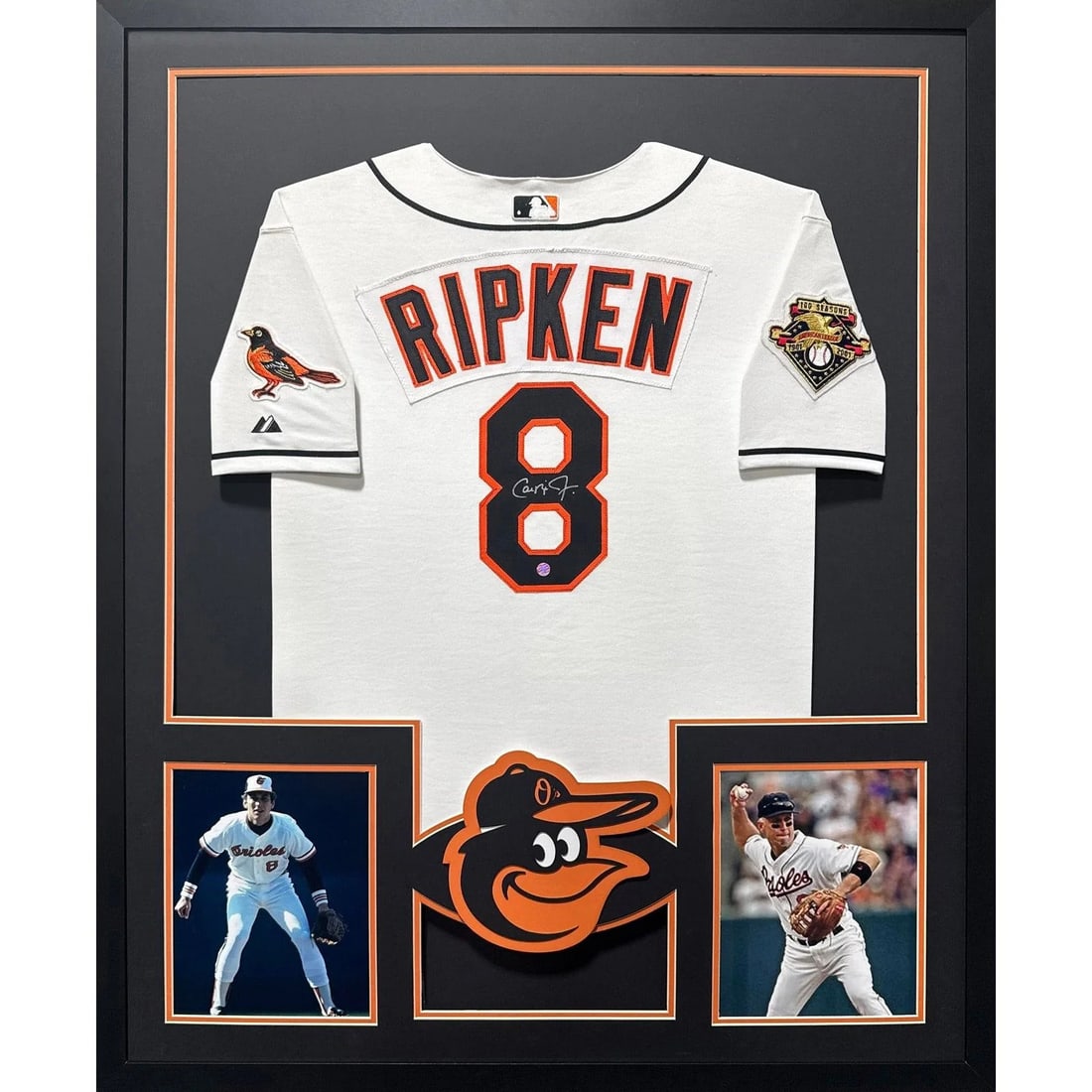 Framed Baltimore Orioles Jersey Signed by Cal Ripken with Company Authentication: Framed Baltimore Orioles Jersey Signed by Cal Ripken with Company Authentication This framed Baltimore Orioles jersey is autographed by Cal Ripken and includes authentication from Ripken's Company, fe