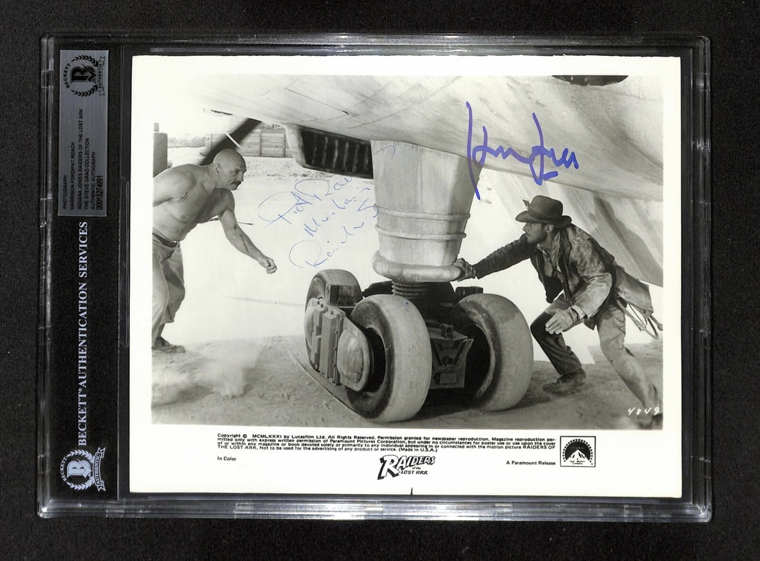 Harrison Ford Pat Roach Signed 8x10 Photo Raiders Beckett Authenticated: Harrison Ford Pat Roach Signed 8x10 Photo Raiders Beckett Authenticated This is a rare 8x10 black and white photograph from the iconic film Raiders of the Lost Ark, featuring the signatures of Harriso