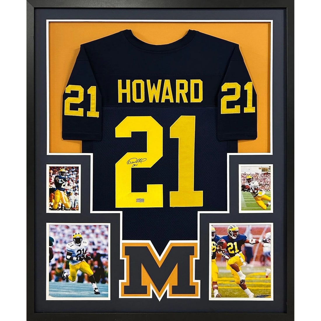 Framed Michigan jersey signed by Desmond Howard with Tristar authentication: Framed Michigan jersey signed by Desmond Howard with Tristar authentication This framed Michigan jersey is autographed by Desmond Howard and authenticated by Tristar, featuring a tamper-proof sticker 